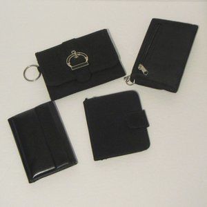Assortment of black nylon and canvas wallets, photo holders and notebooks